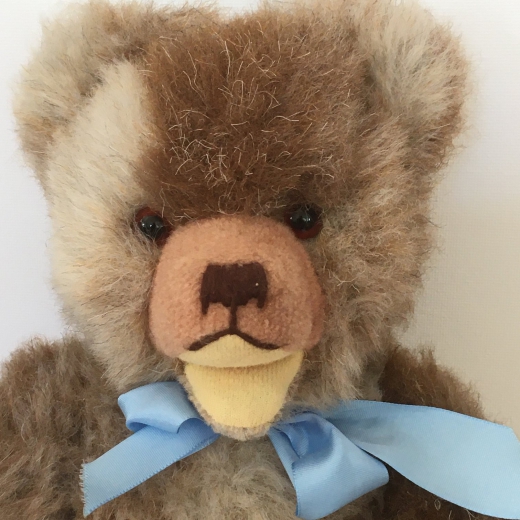 Antique teddy bear with light blue bow (29 cm)